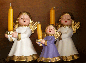 Immagine angeli con candela che cantano